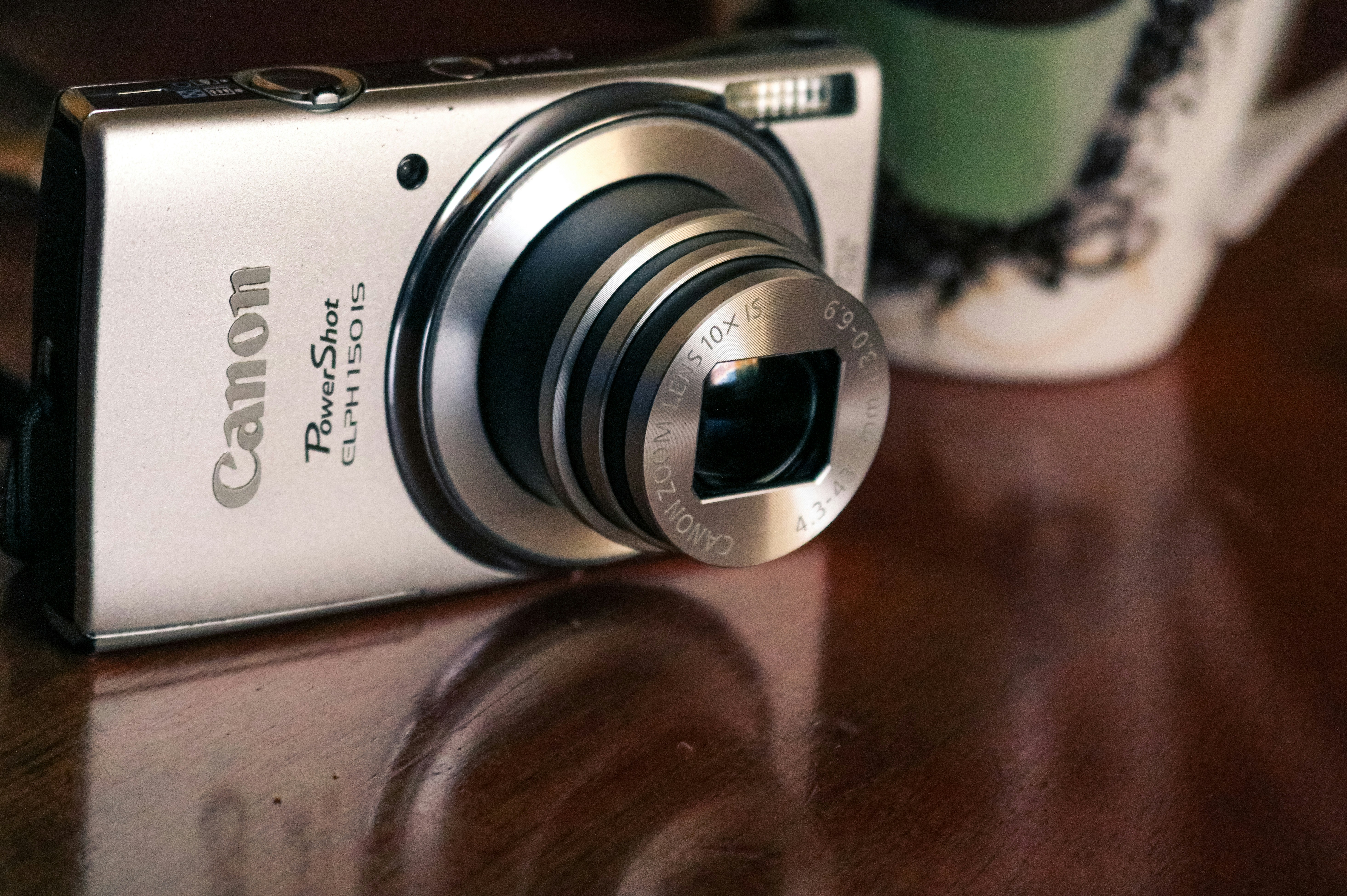 white and black canon camera