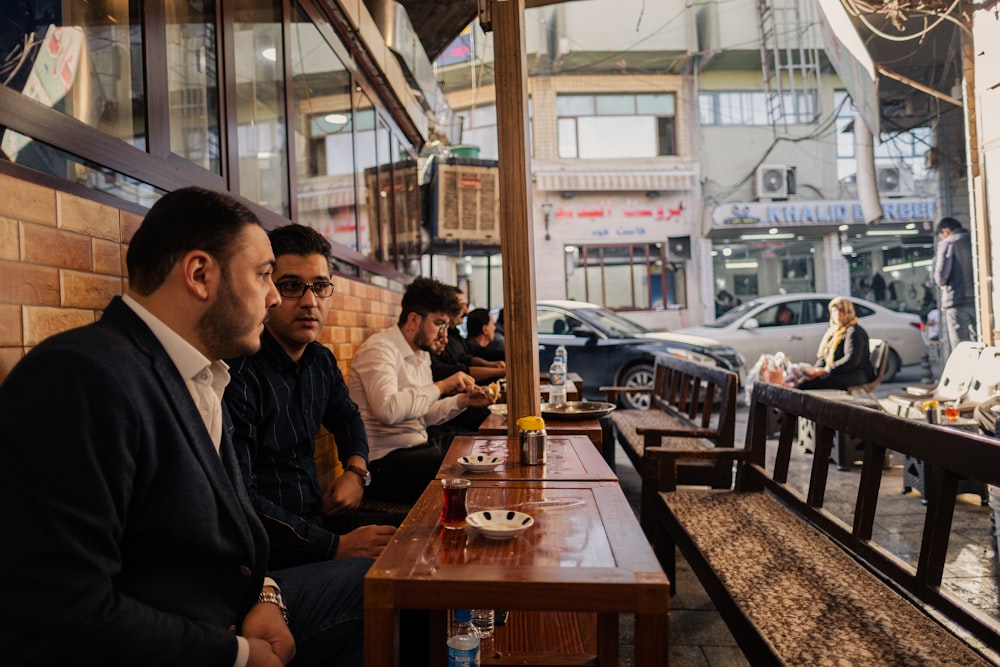 people sitting on chair in restaurant