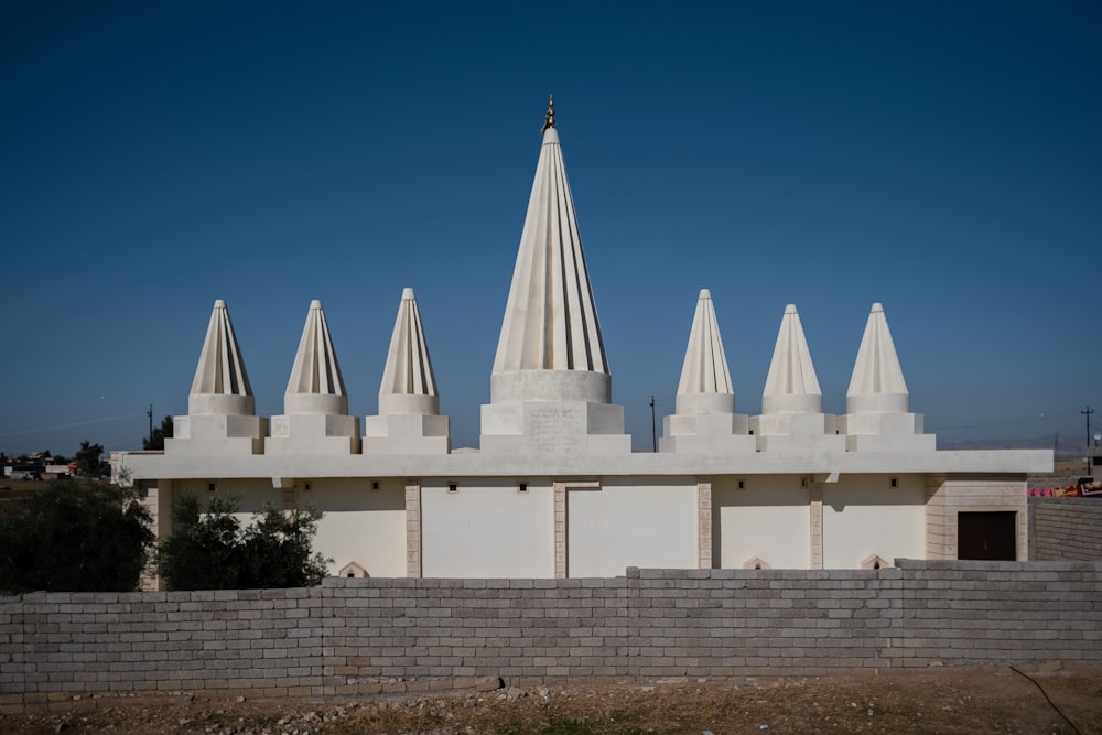 white concrete building under blue sky during daytime