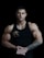 man in black tank top with tattoo on arm