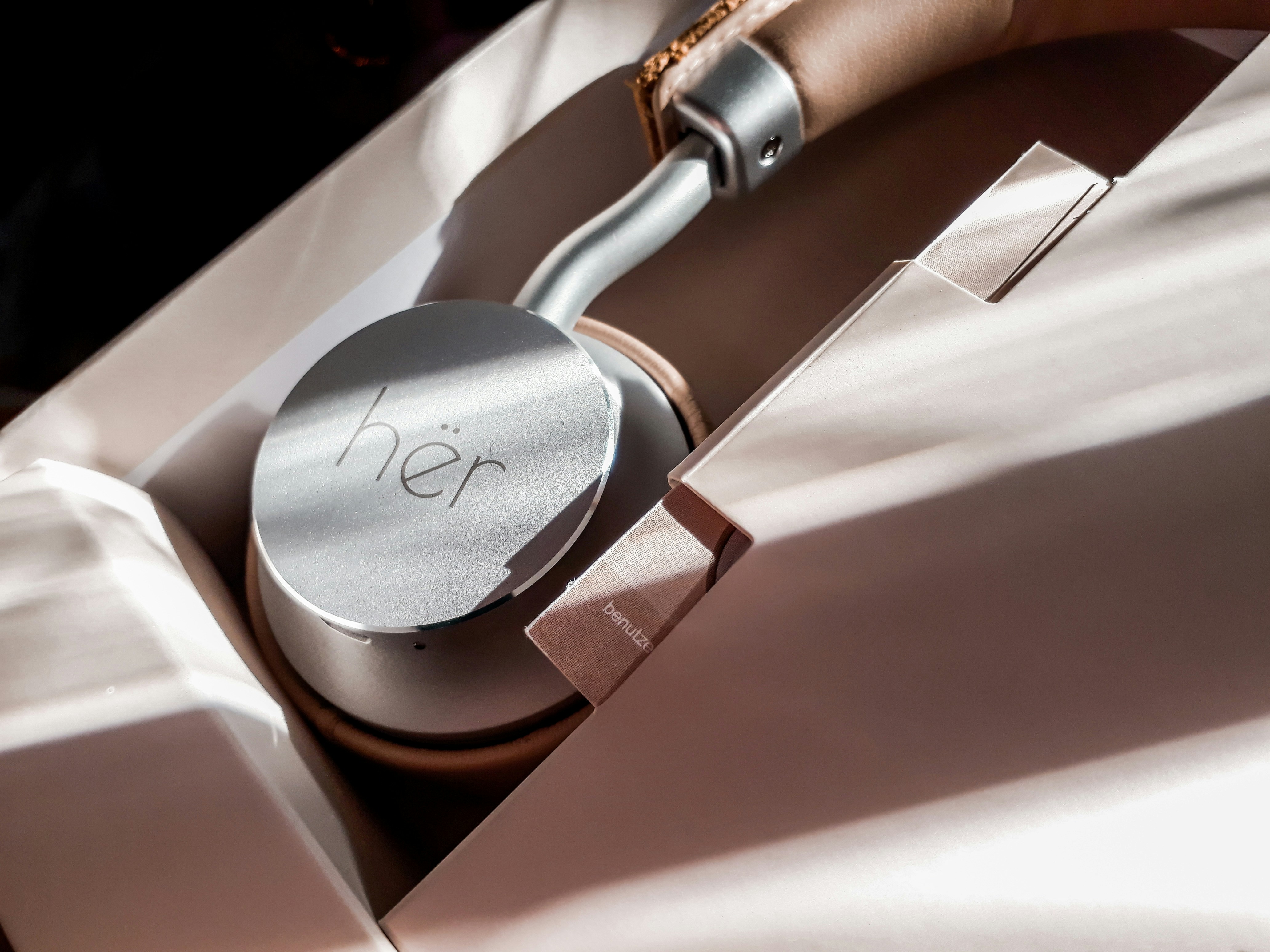 silver and black sony headphones