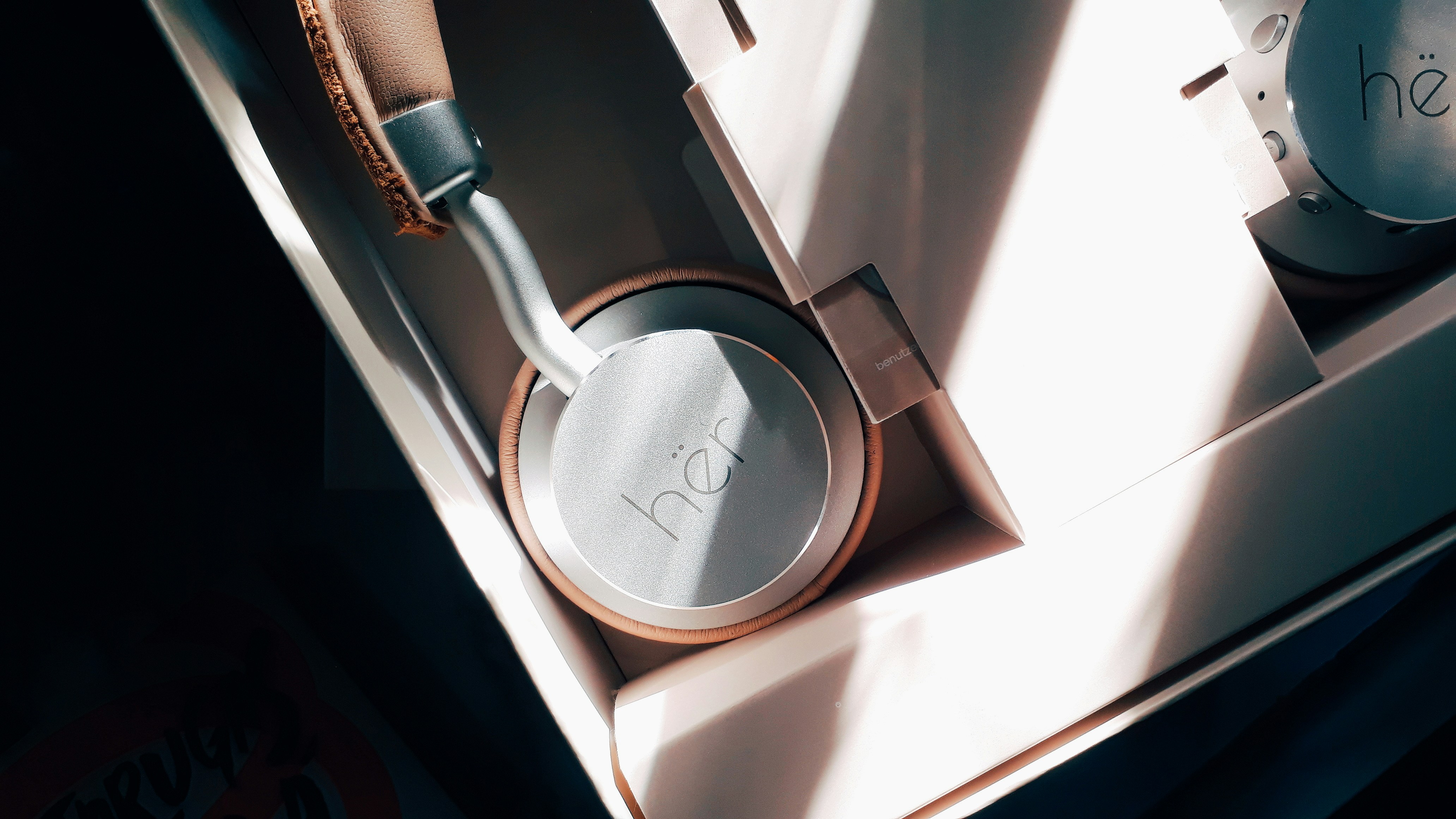 silver and gold sony headphones