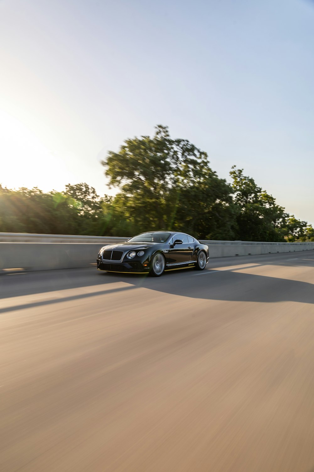 black porsche 911 on road during daytime