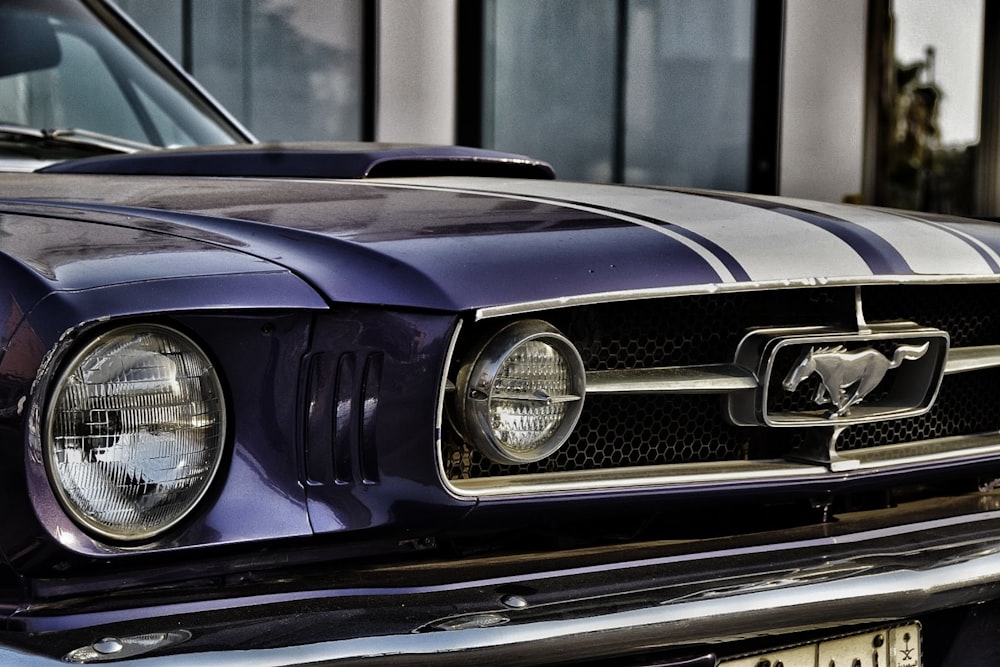 purple car with yellow and silver light