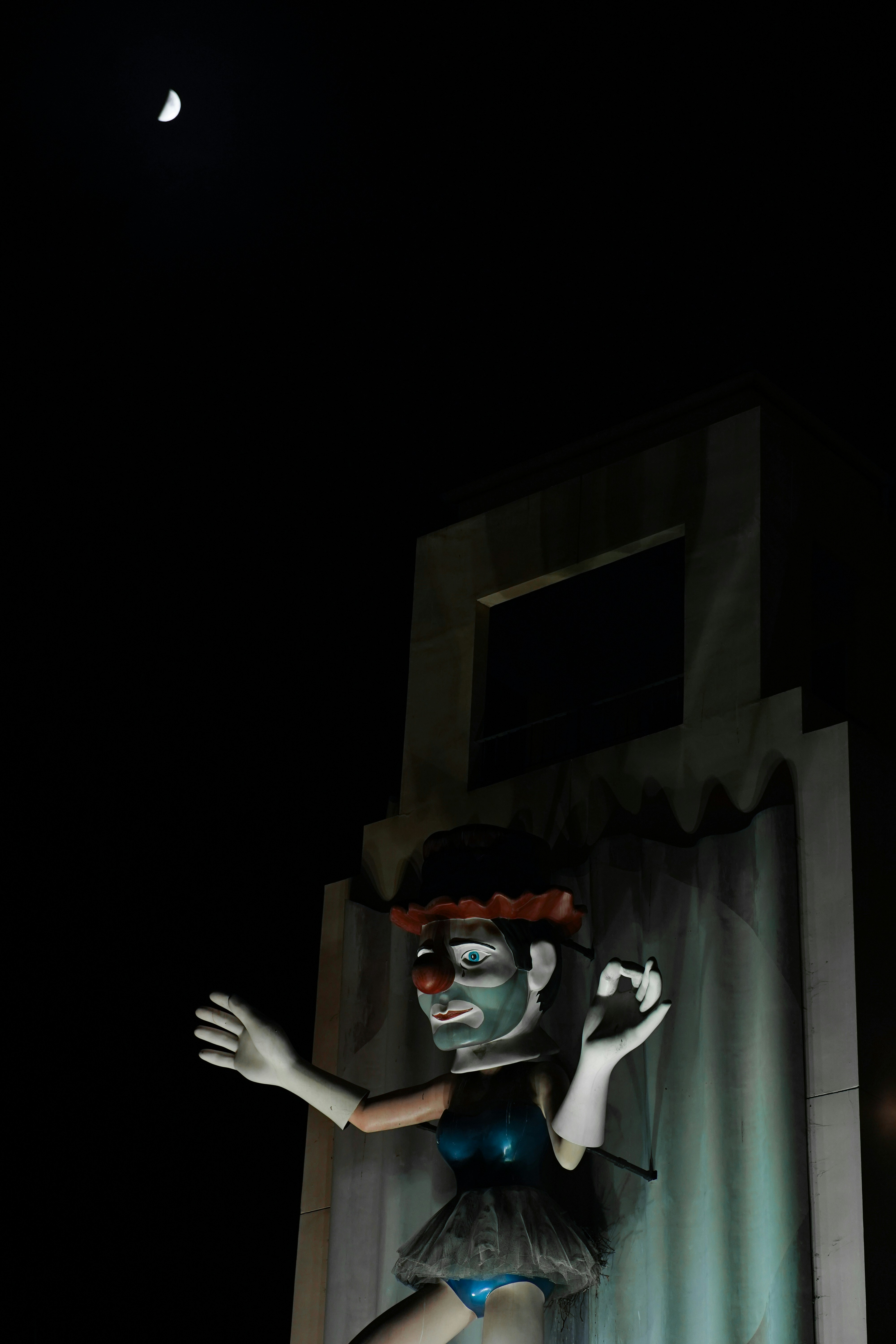 a statue of a woman in a blue dress