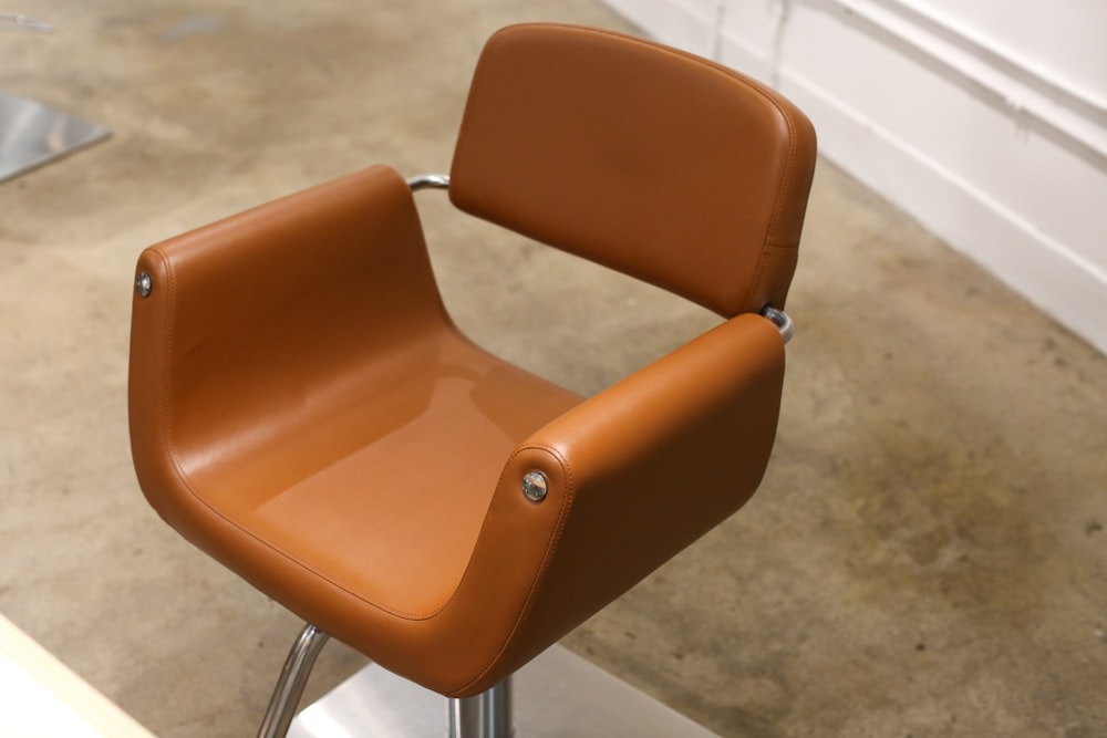 brown and gray metal chair