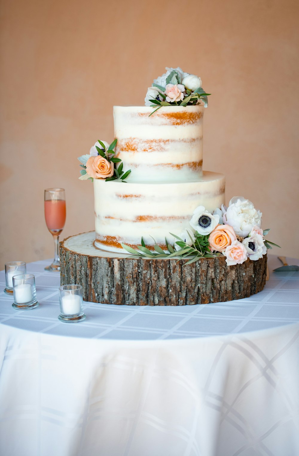white and brown cake on brown woven tray