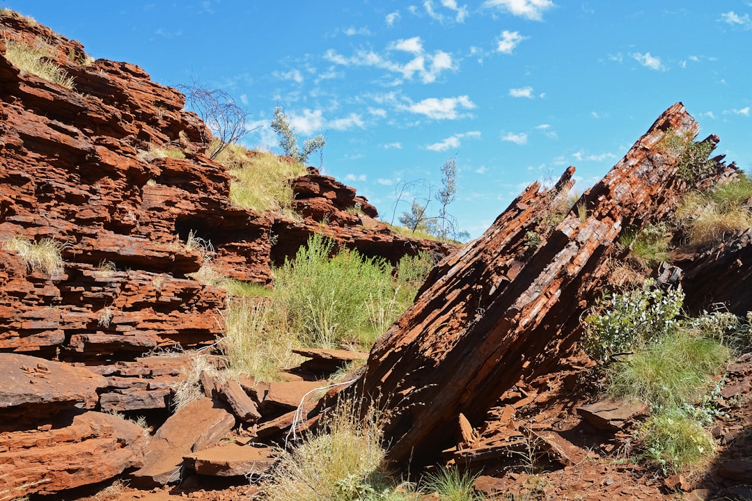 brown rock formation under blue sky during daytime