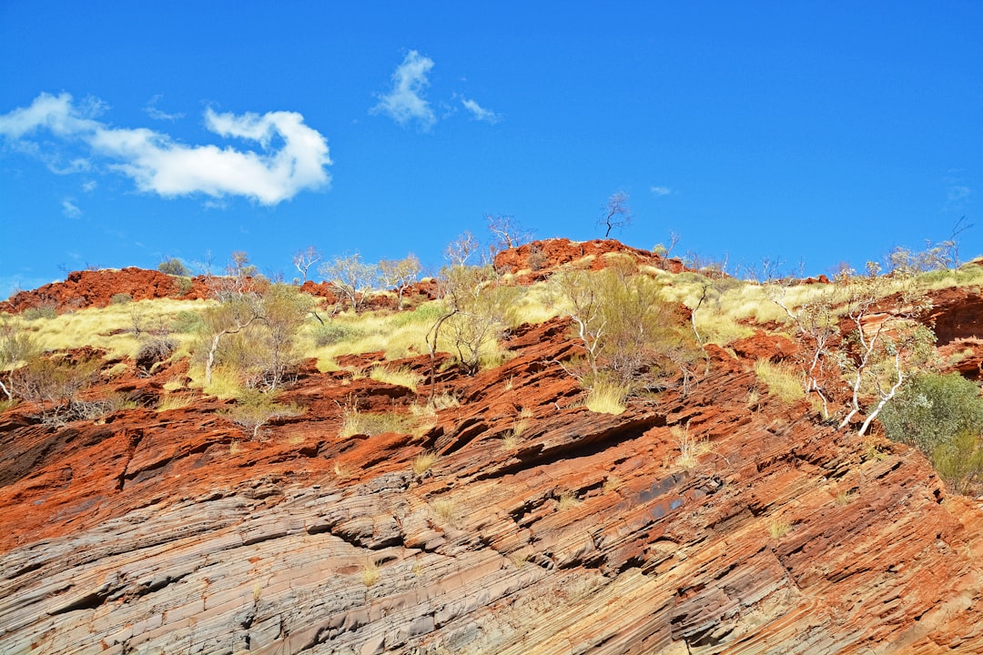 brown rocky mountain under blue sky during daytime