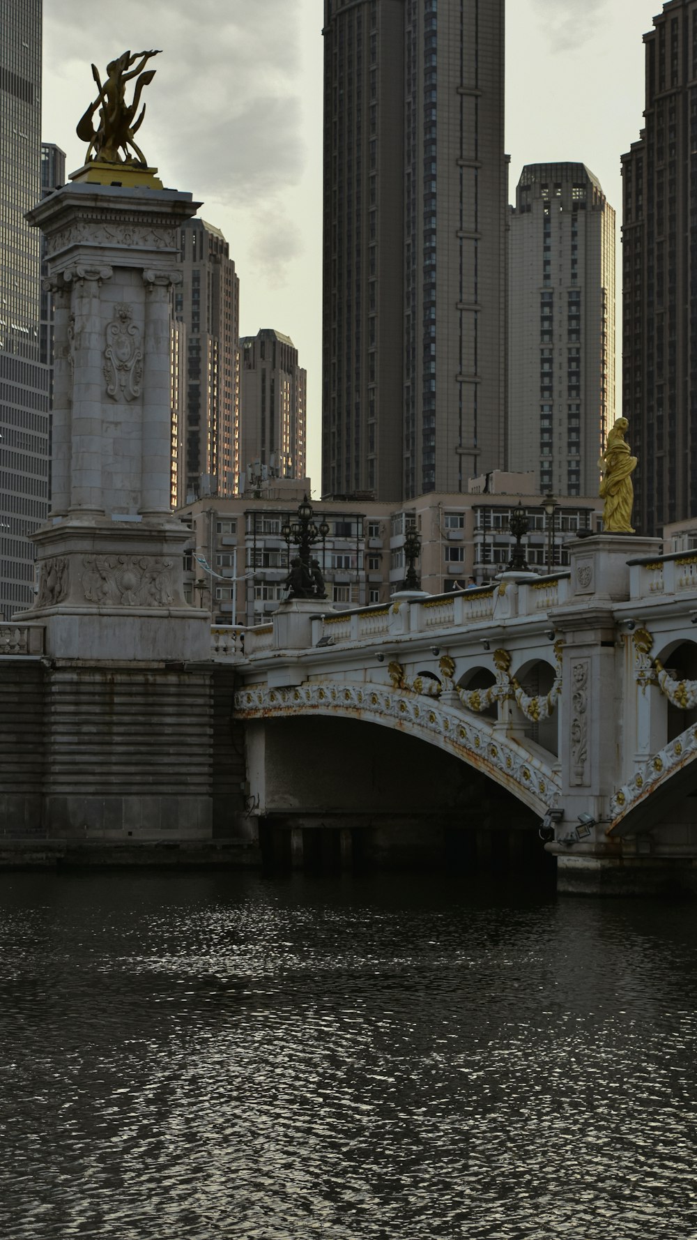 white concrete bridge over river