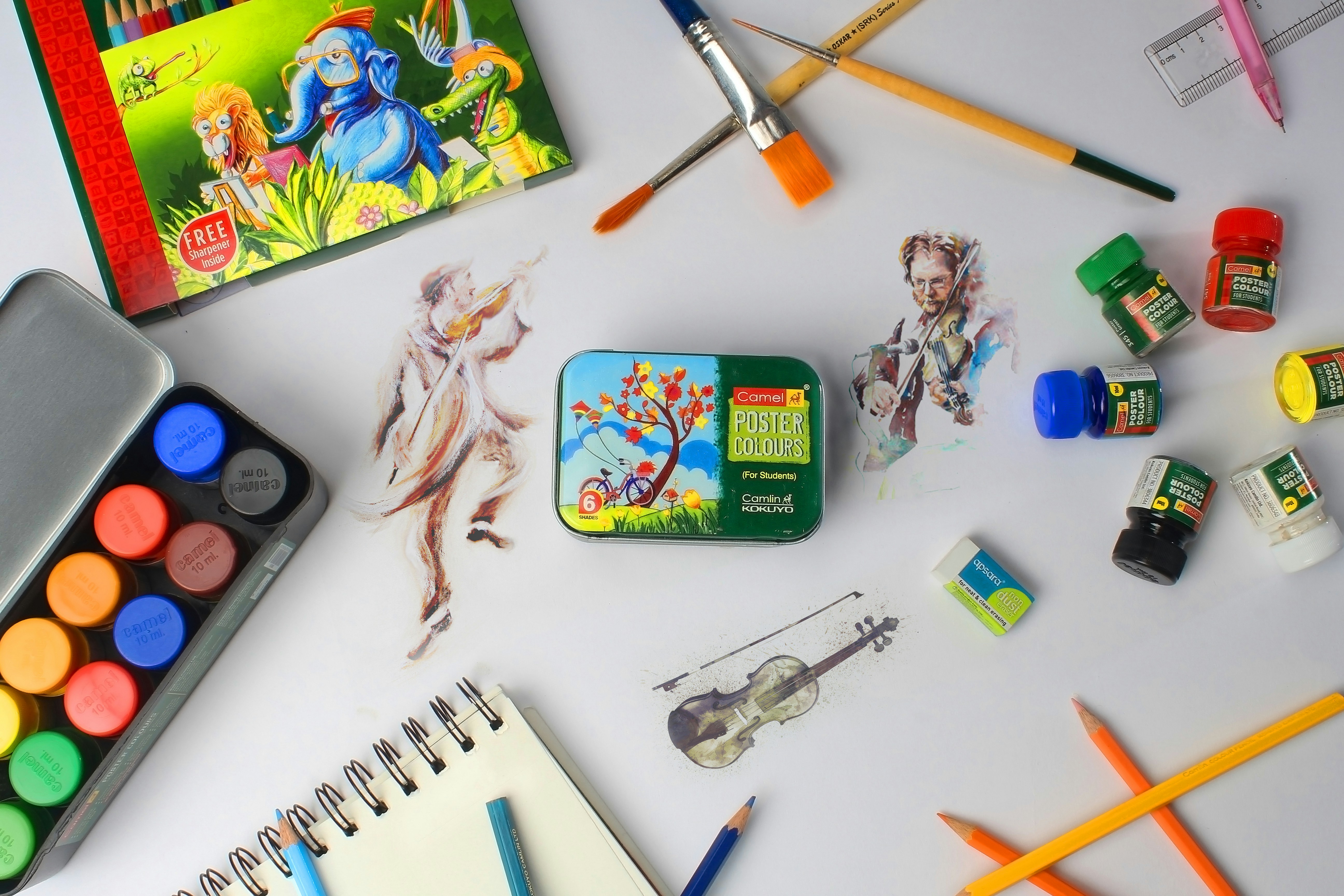 assorted color pen and scissors