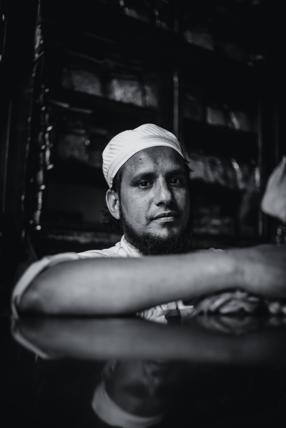 man in white tank top and white cap