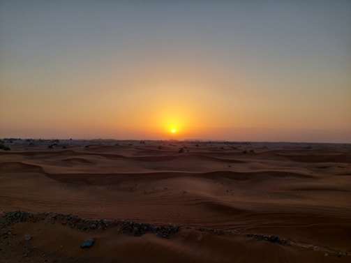 A warm sunset over the Namib desert dunes near Swakopmund.