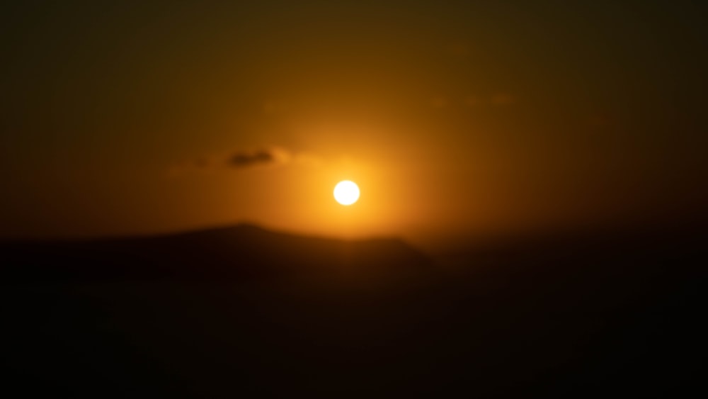 sun setting over the mountains