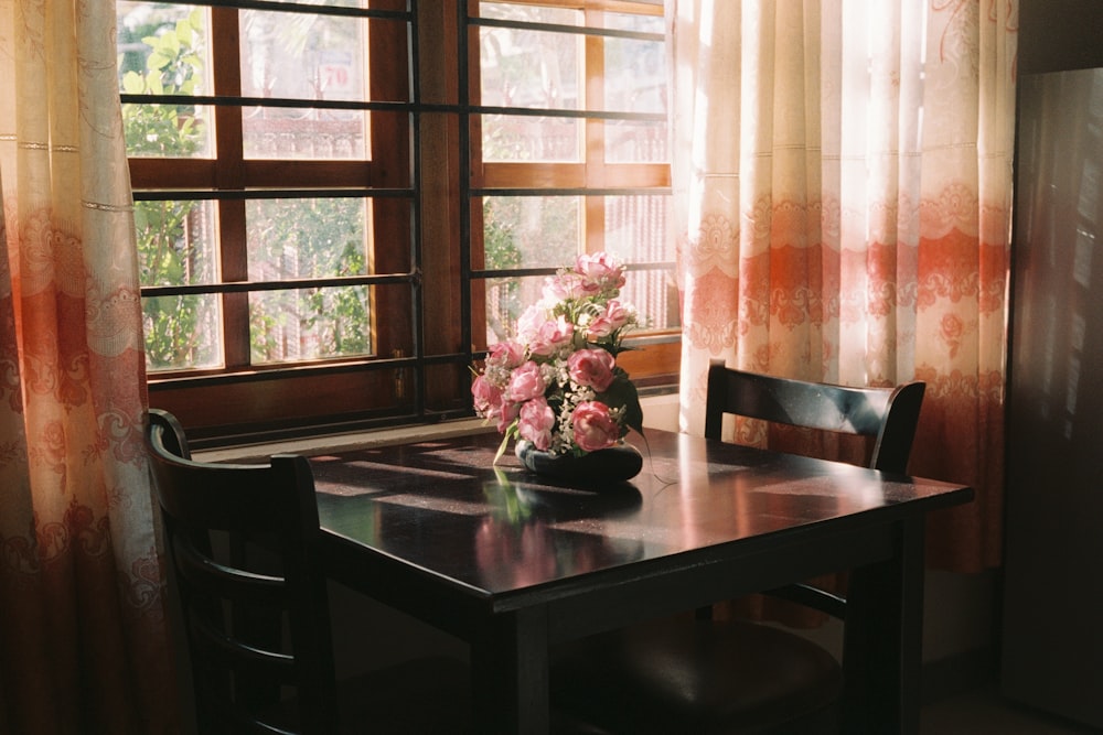 brown wooden table with chairs