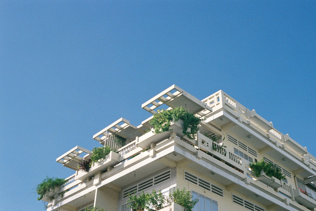 white concrete building under blue sky during daytime