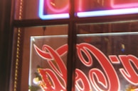 A close-up of a professional business sign in a commercial area.