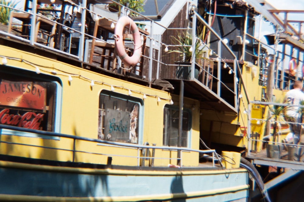 yellow and green boat on water