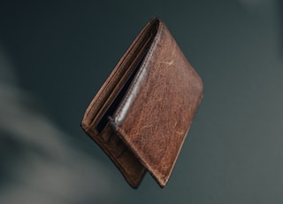 brown wooden box on white surface