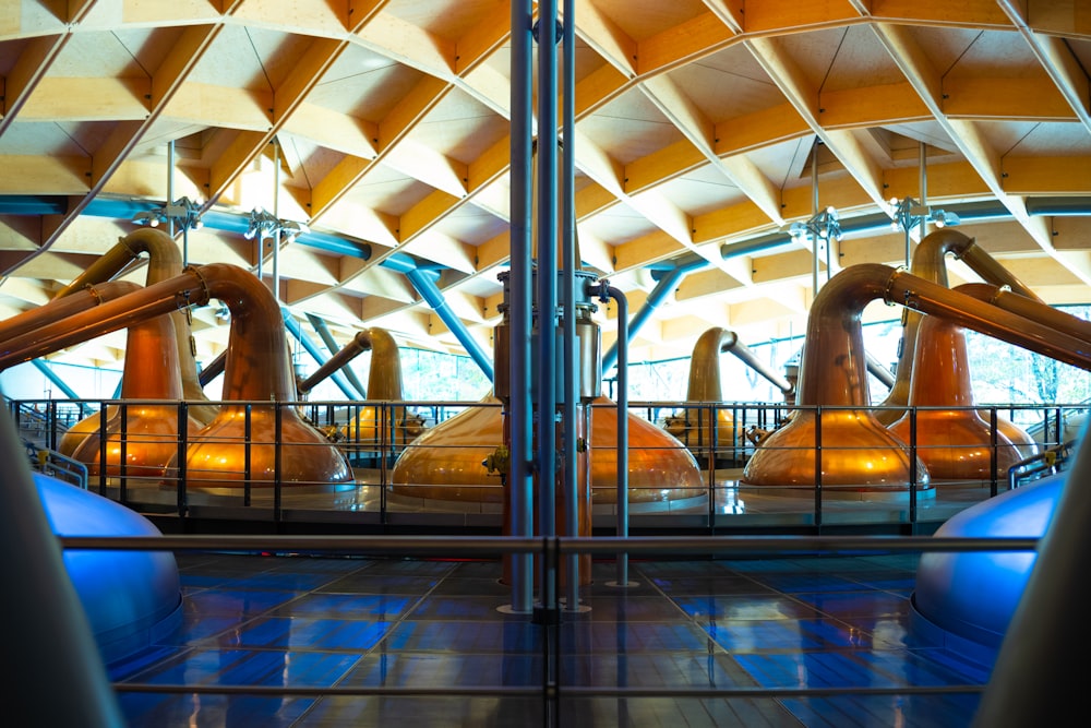 brown wooden statue in a glass building