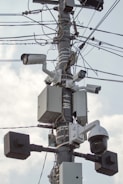 white and black metal electric post