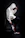 man in white long sleeve shirt and black pants sitting on black chair