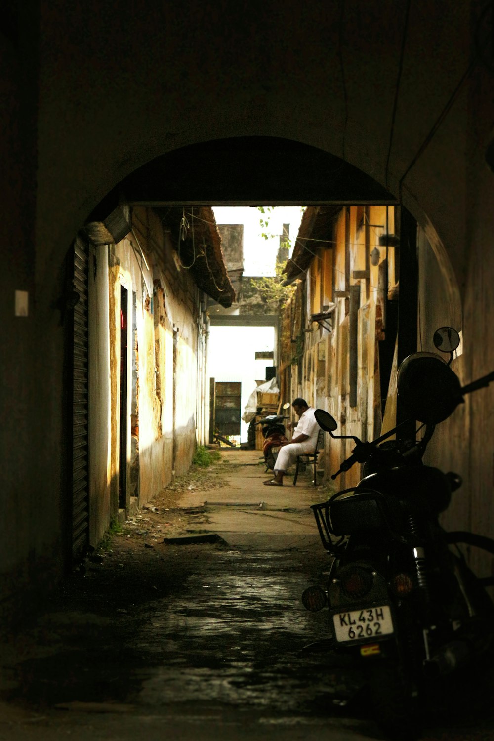 man in black shirt sitting on black wheelchair