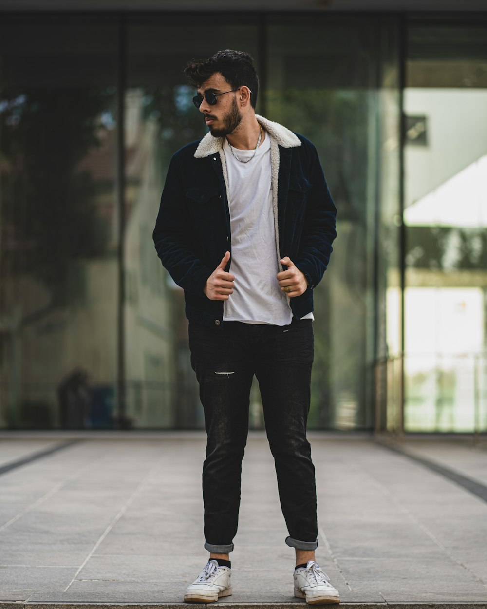 Man in black blazer and black pants standing on white floor tiles photo –  Free Tel aviv Image on Unsplash