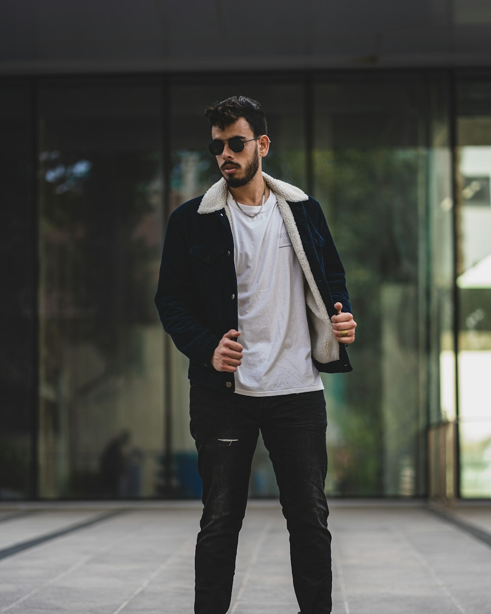 Man in black jacket and white shirt standing on gray pavement photo – Free  Tel aviv Image on Unsplash