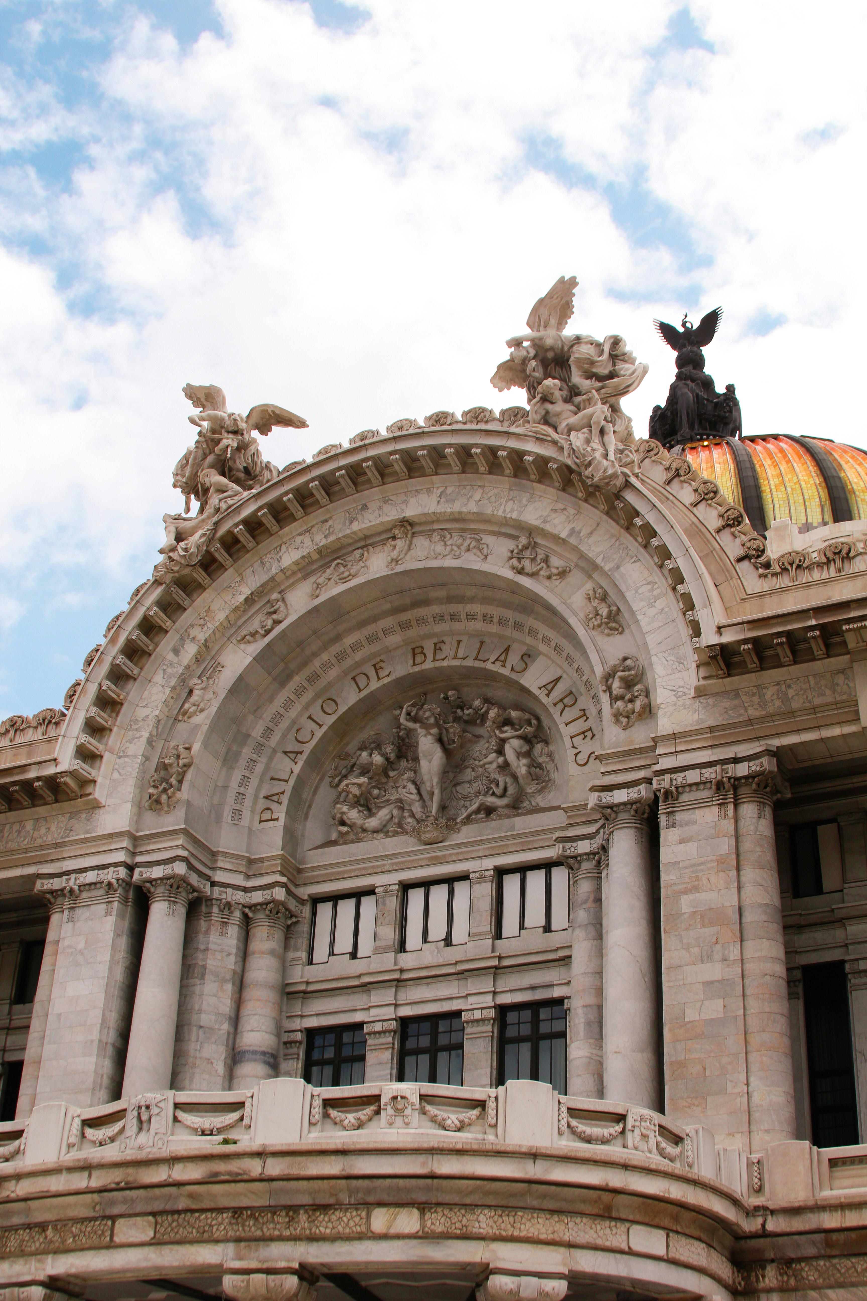 white and brown concrete building under blue sky during daytime