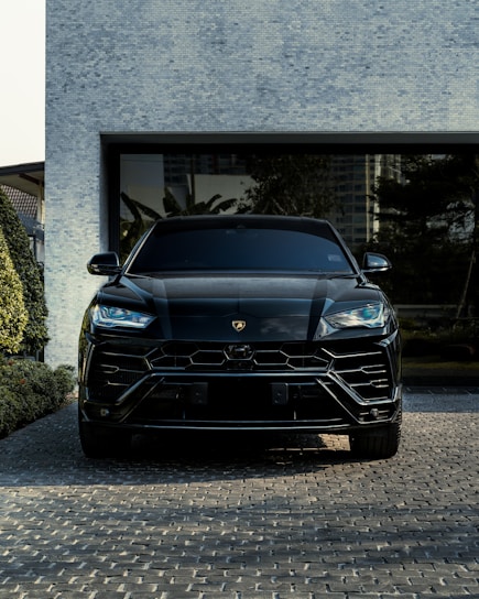 black bmw car parked near building