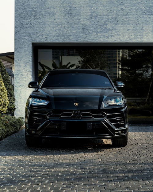 black bmw car parked near building