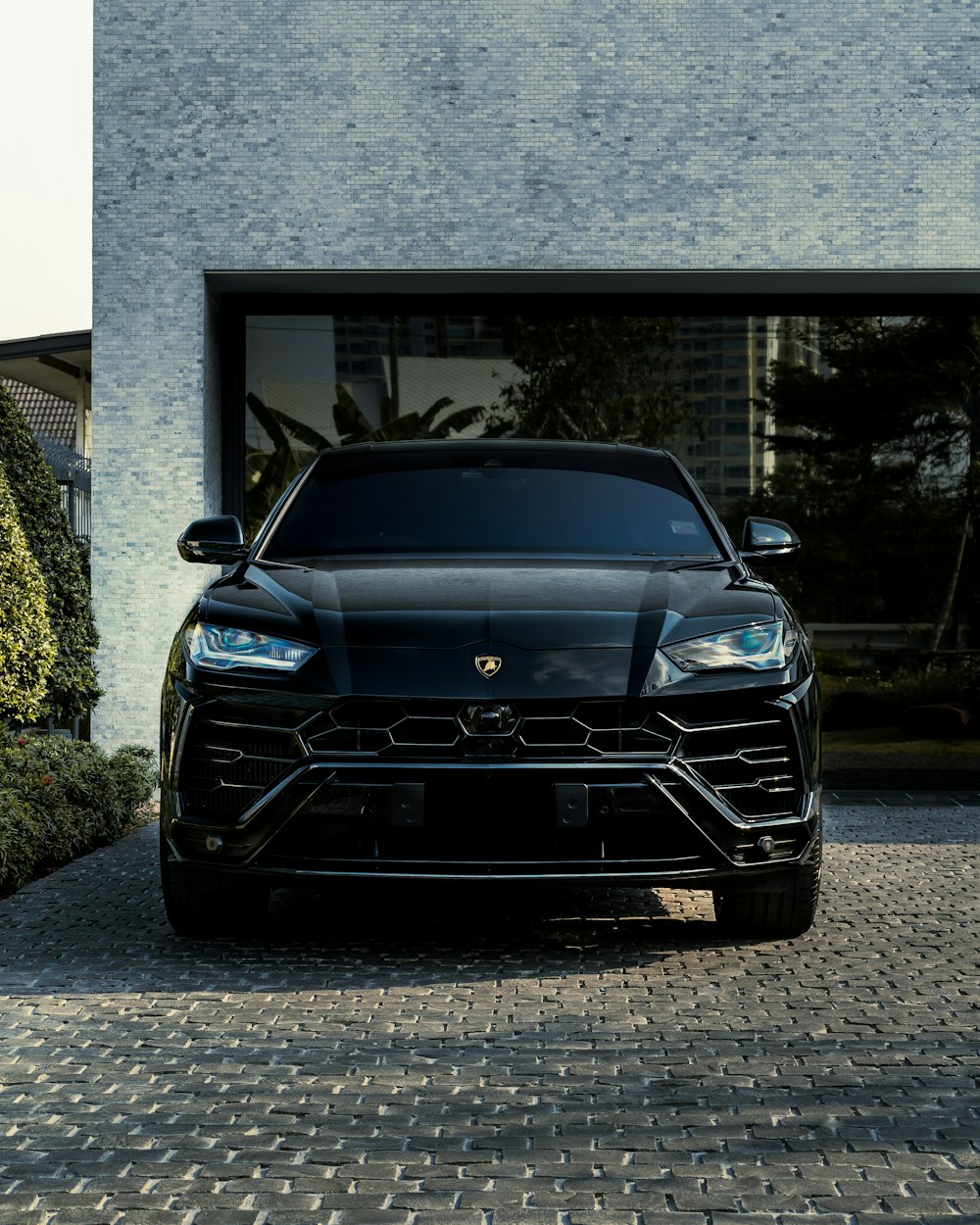 black bmw car parked near building