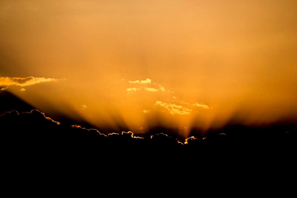 silhouette of mountain during sunset