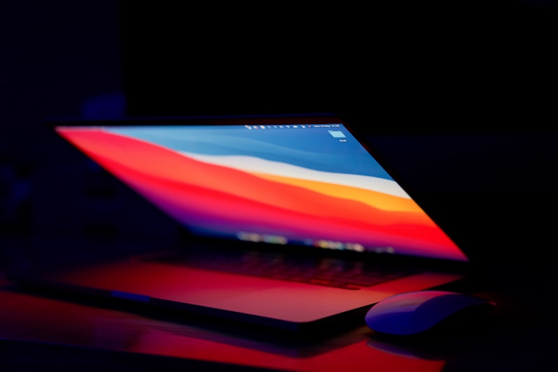 Black laptop computer displaying a blue terminal screen