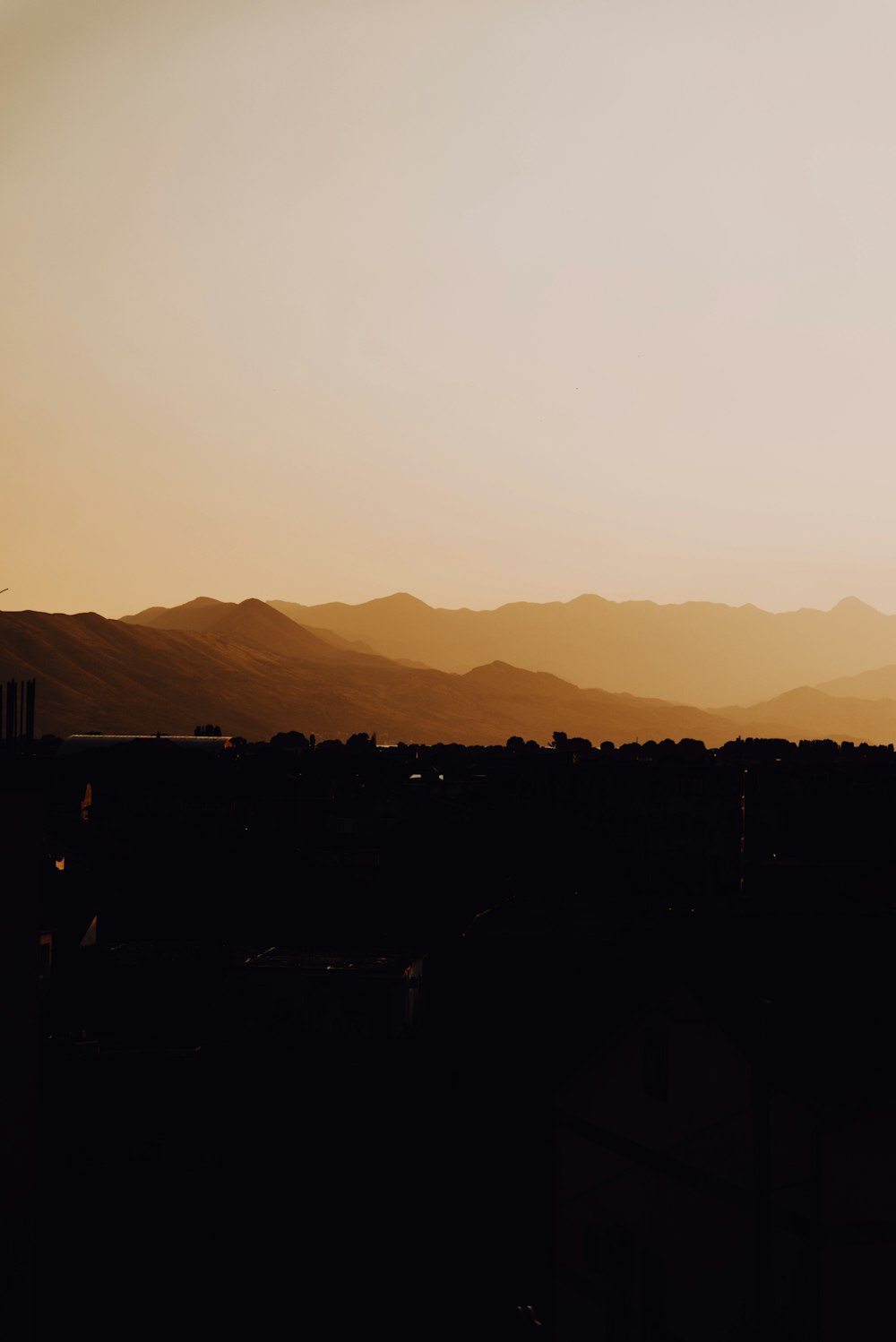 silhouette of mountain during sunset