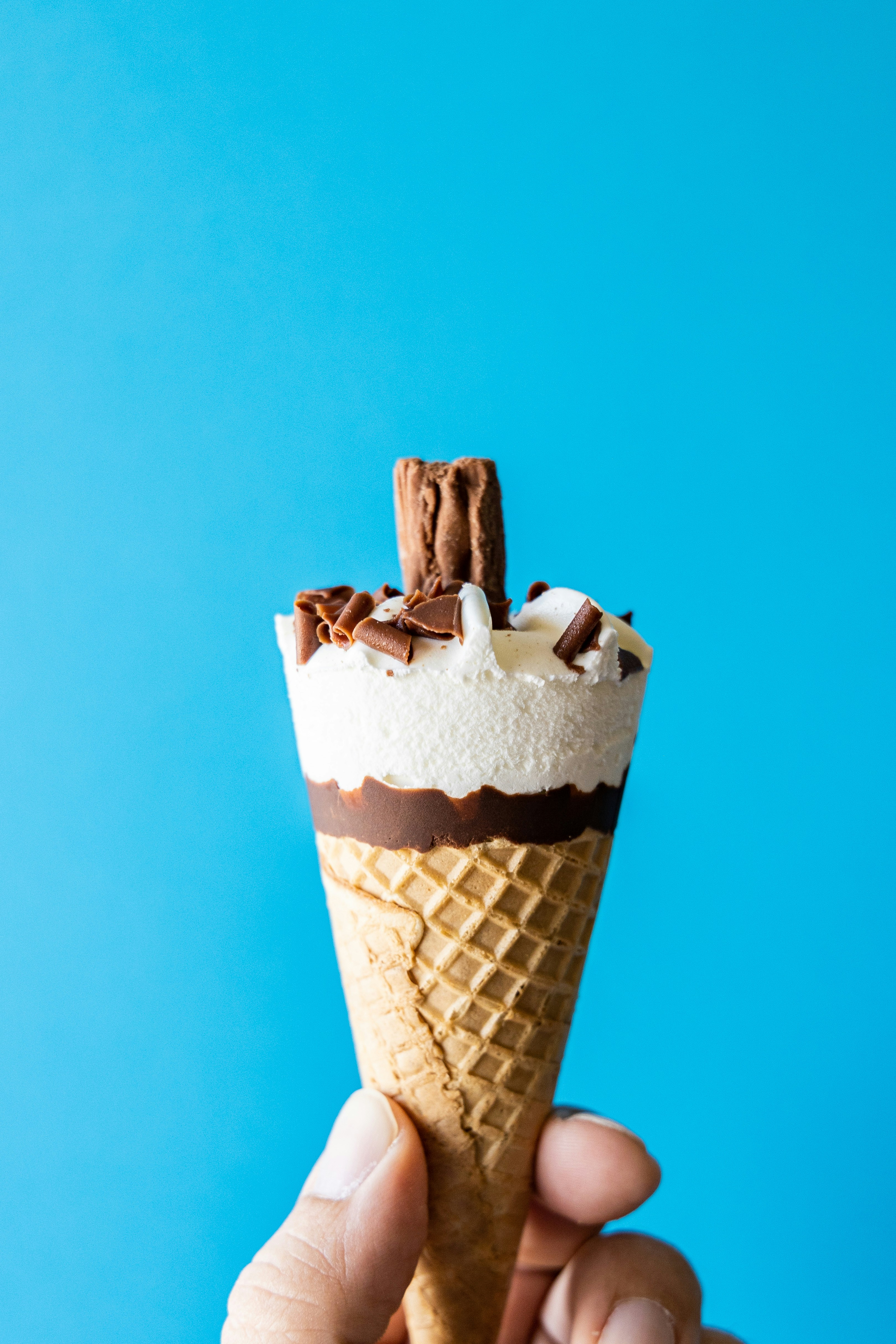 white and brown ice cream cone