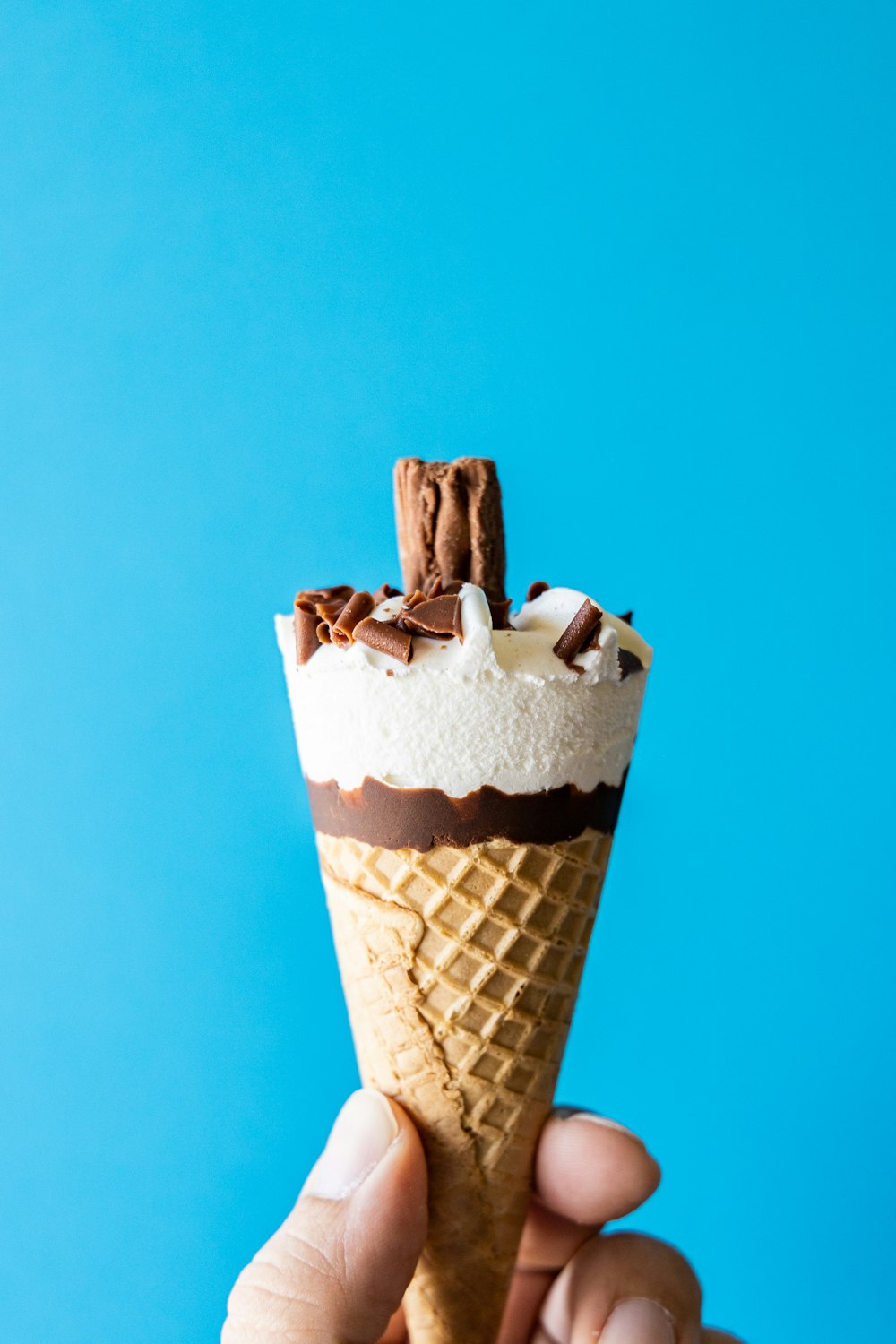 white and brown ice cream cone