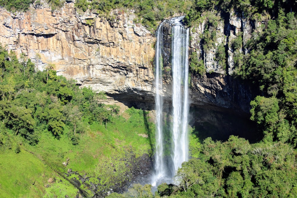 waterfalls in the middle of the forest