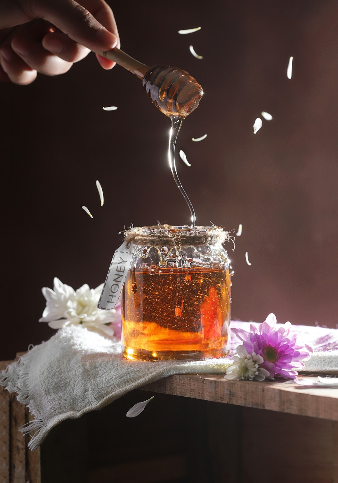 clear glass jar with brown liquid