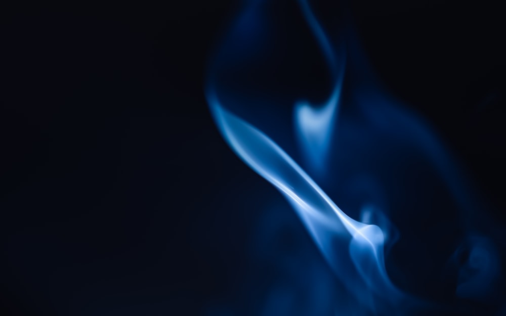 white smoke on black background