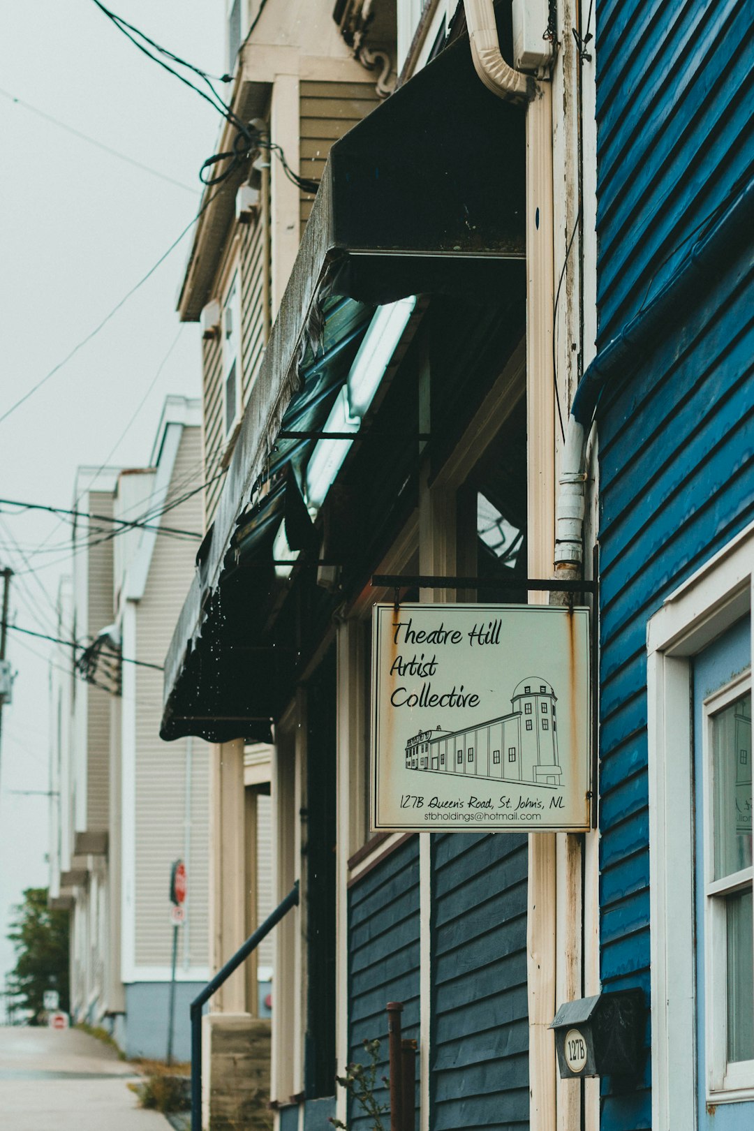 white and black wooden signage