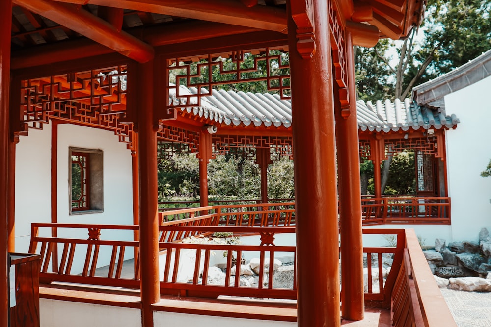 red wooden framed glass window