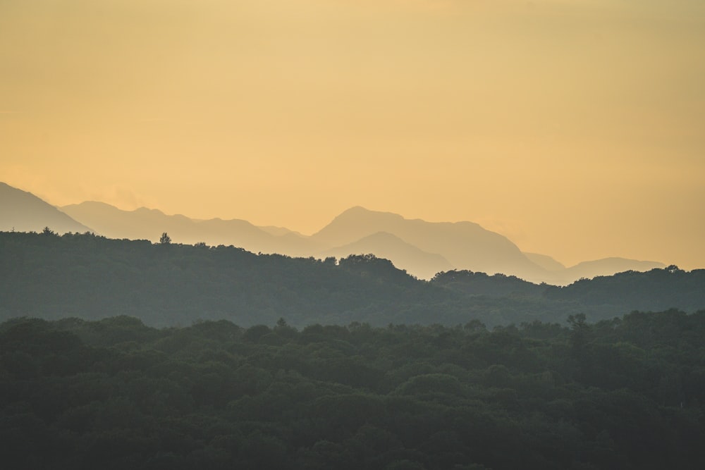 silhouette of mountains during sunset