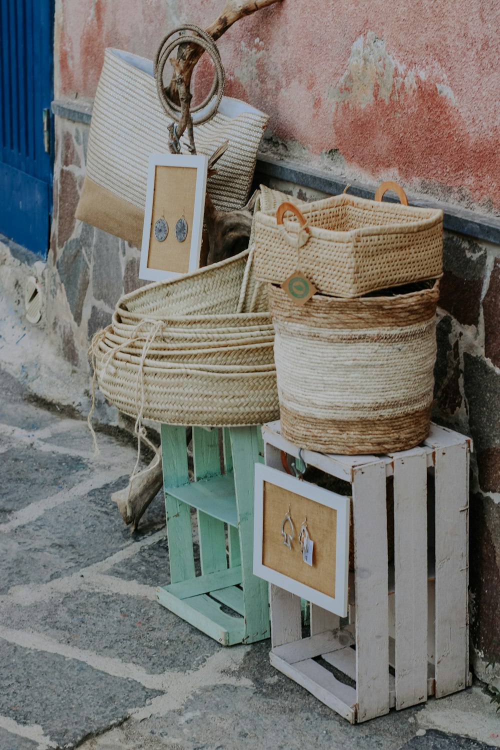 brown woven basket on green wooden table