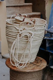 white woven basket on brown wooden table