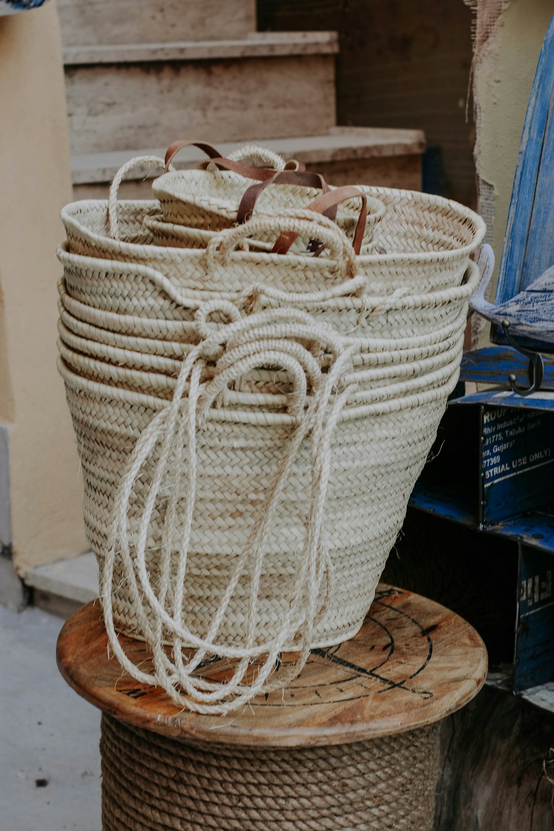 white woven basket on brown wooden table