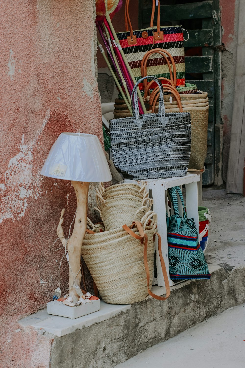 white woven basket on gray concrete floor