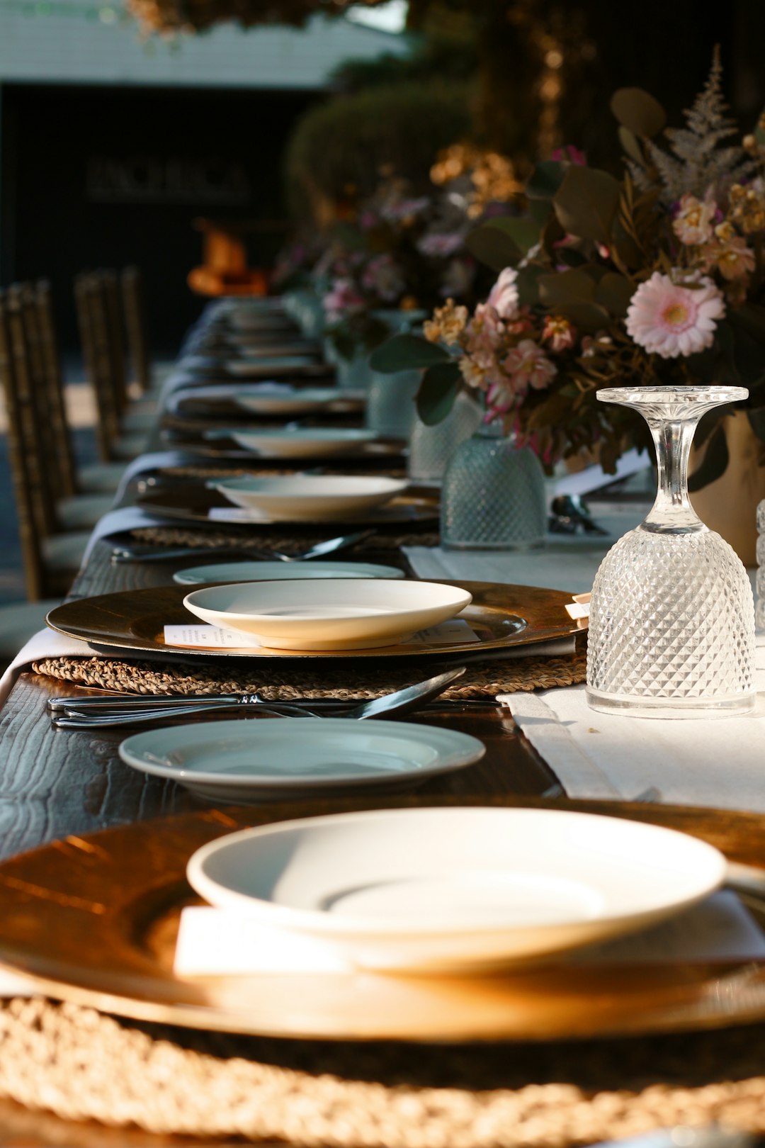 white ceramic round plate on brown wooden table