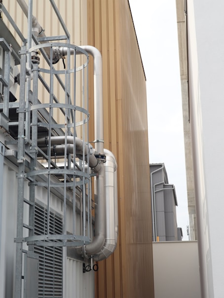 gray metal spiral staircase during daytime
